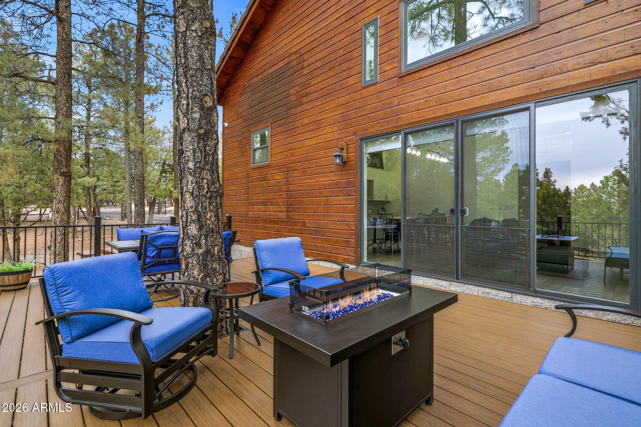 2287 Richenbacher Circle Overgaard, AZ 85933 - Photo 7 of 46 a outdoor space with patio the couches and a dining table with garden view