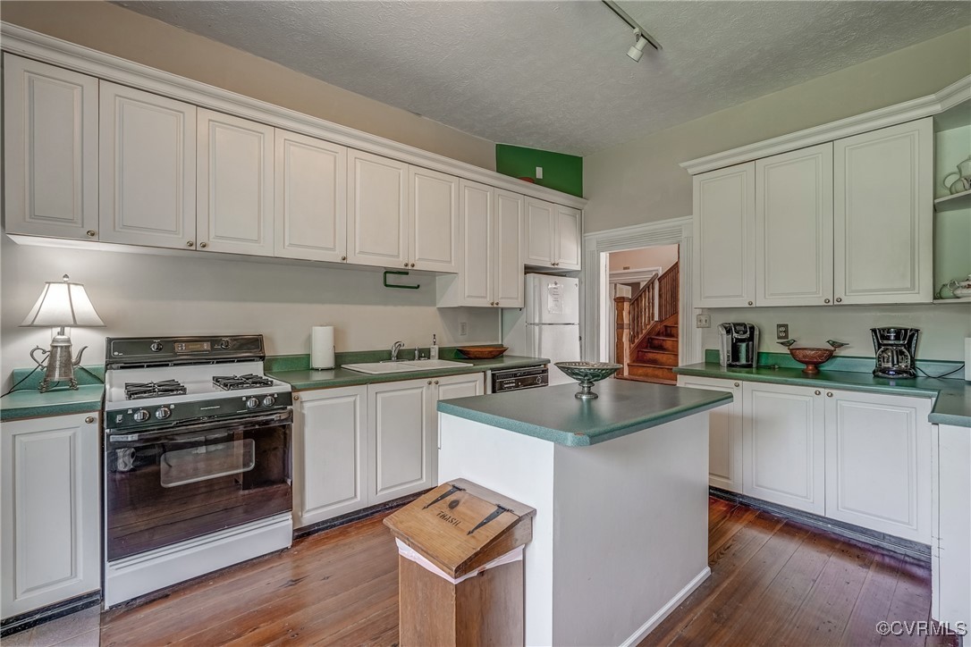 23 Courthouse Road Buckingham, VA 23921 - Photo 20 of 50 a kitchen with stainless steel appliances granite countertop a stove a sink dishwasher and a refrigerator