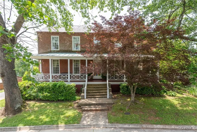 a front view of house with yard