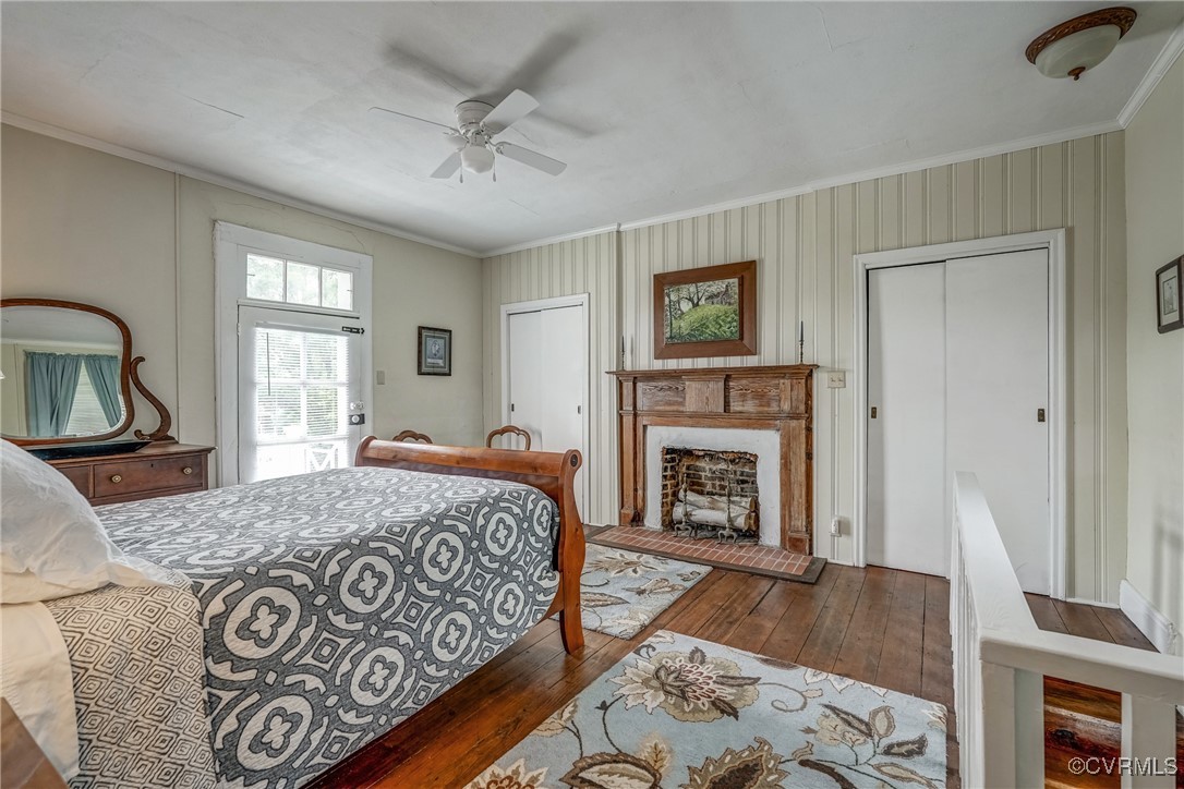 23 Courthouse Road Buckingham, VA 23921 - Photo 39 of 50 a bedroom with a bed and a fireplace