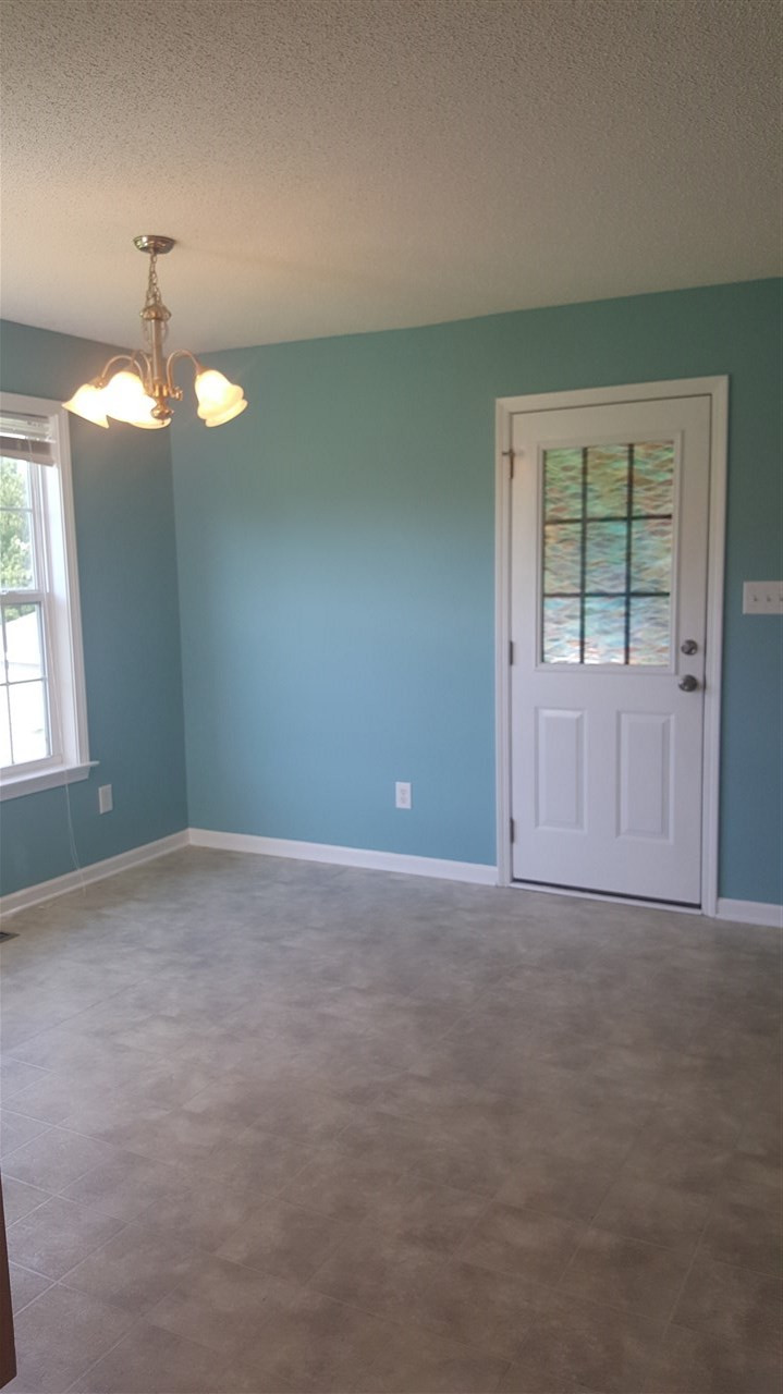 668 Slate Top House Road Clayton, NC 27520 - Photo 18 of 27 Right off the dining area you enter your covered Porch perfect for Grilling and chillin! 10 x 15 and Ready for Screen! Other