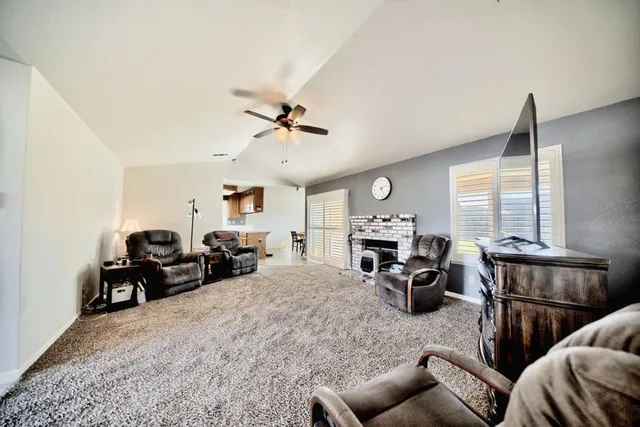 a kitchen with stainless steel appliances granite countertop a stove and a sink