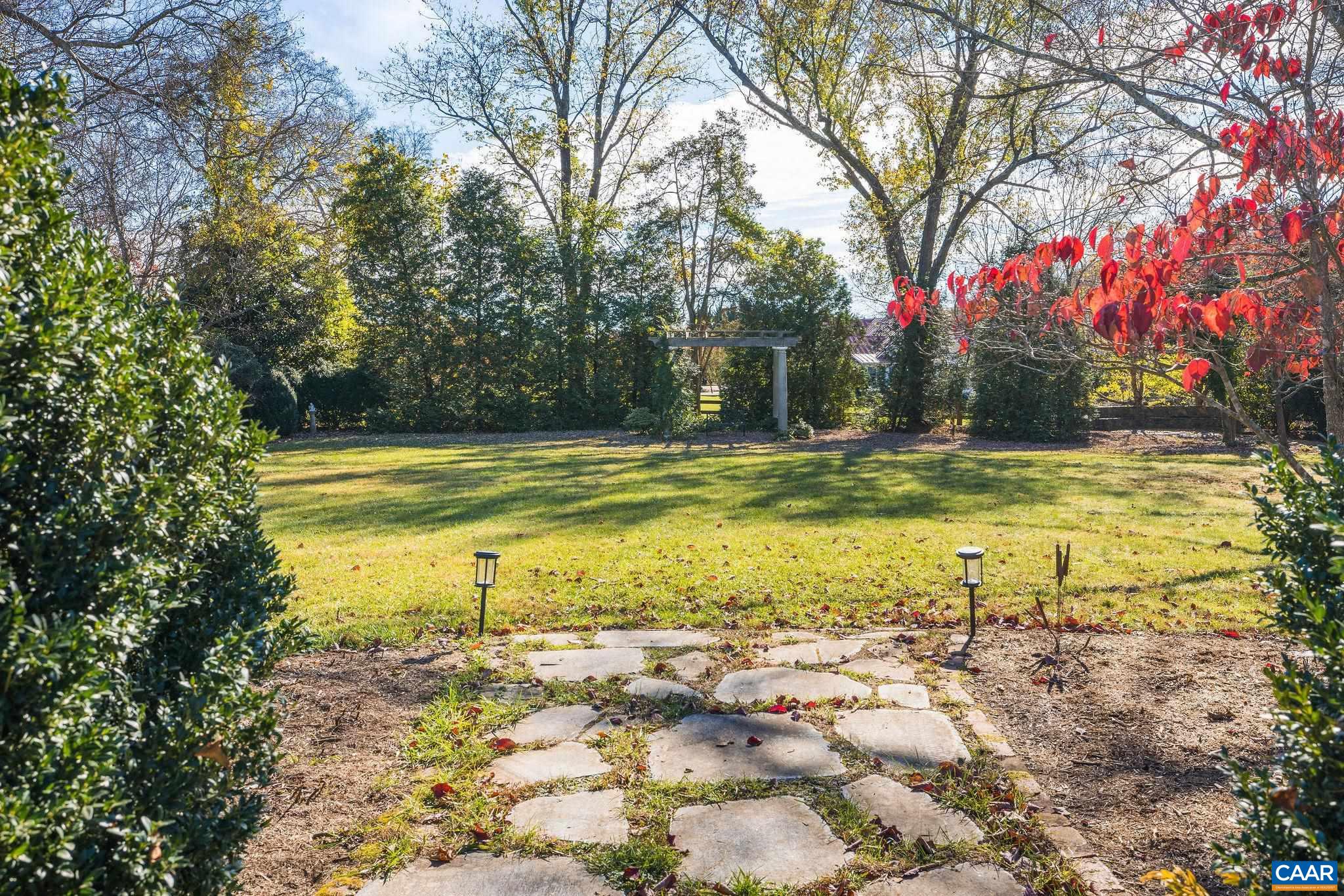 2687 Milton Farm Charlottesville, VA 22902 - Photo 35 of 75 a view of a swimming pool with an outdoor space and seating area