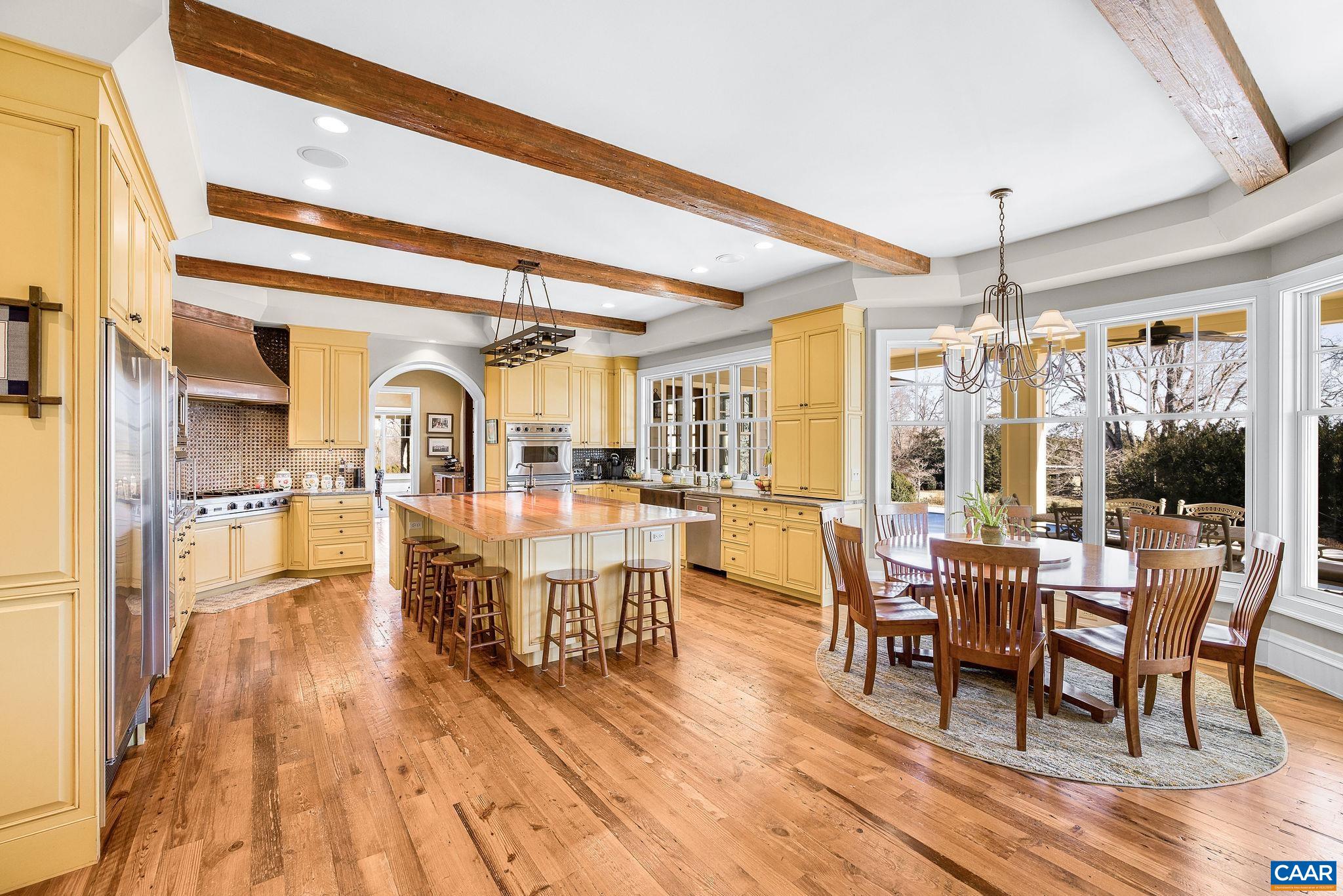 2687 Milton Farm Charlottesville, VA 22902 - Photo 50 of 75 a dining room with furniture window and wooden floor