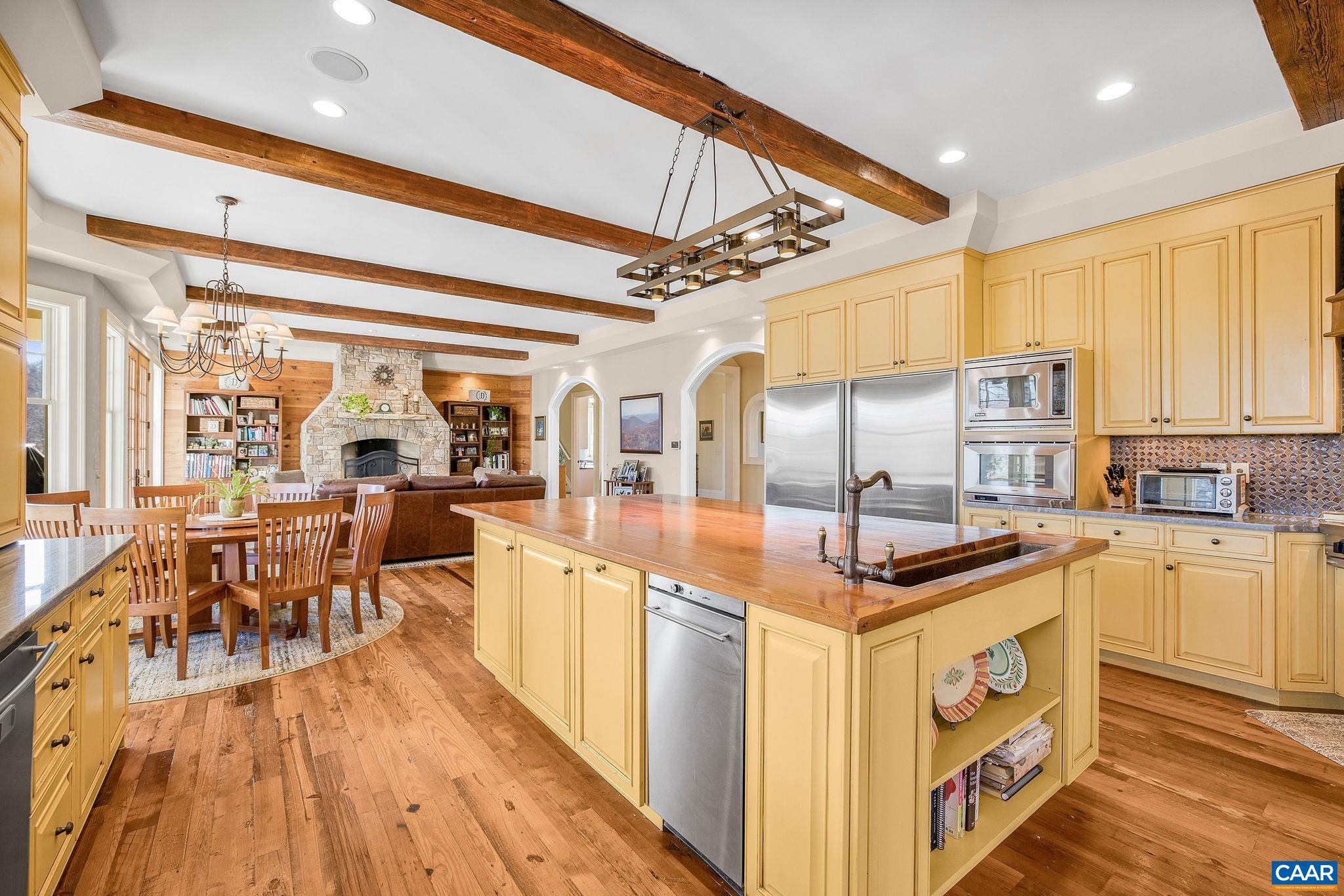 2687 Milton Farm Charlottesville, VA 22902 - Photo 54 of 75 a kitchen with stainless steel appliances granite countertop a stove and cabinets