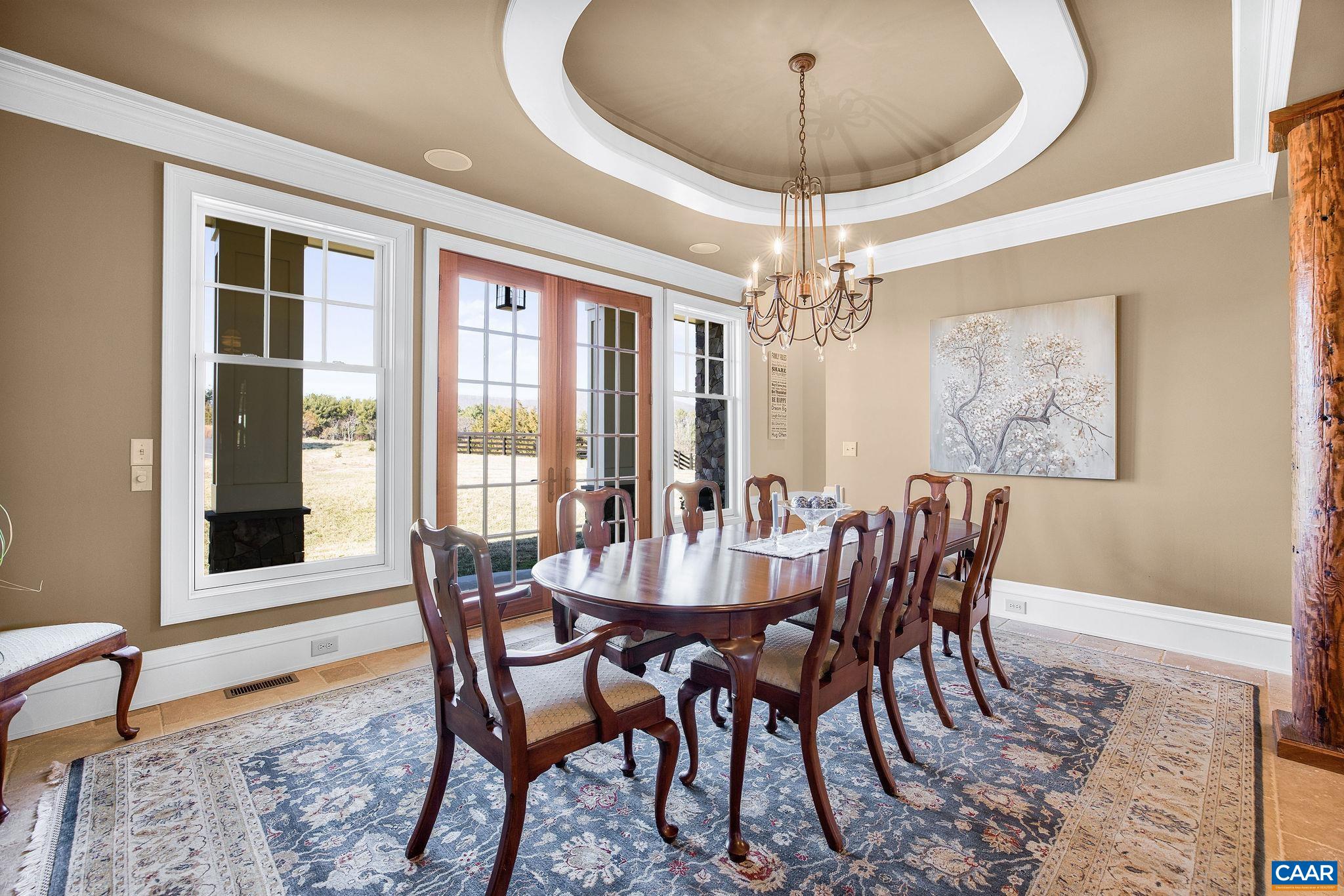 2687 Milton Farm Charlottesville, VA 22902 - Photo 58 of 75 a dining room with furniture a chandelier and window