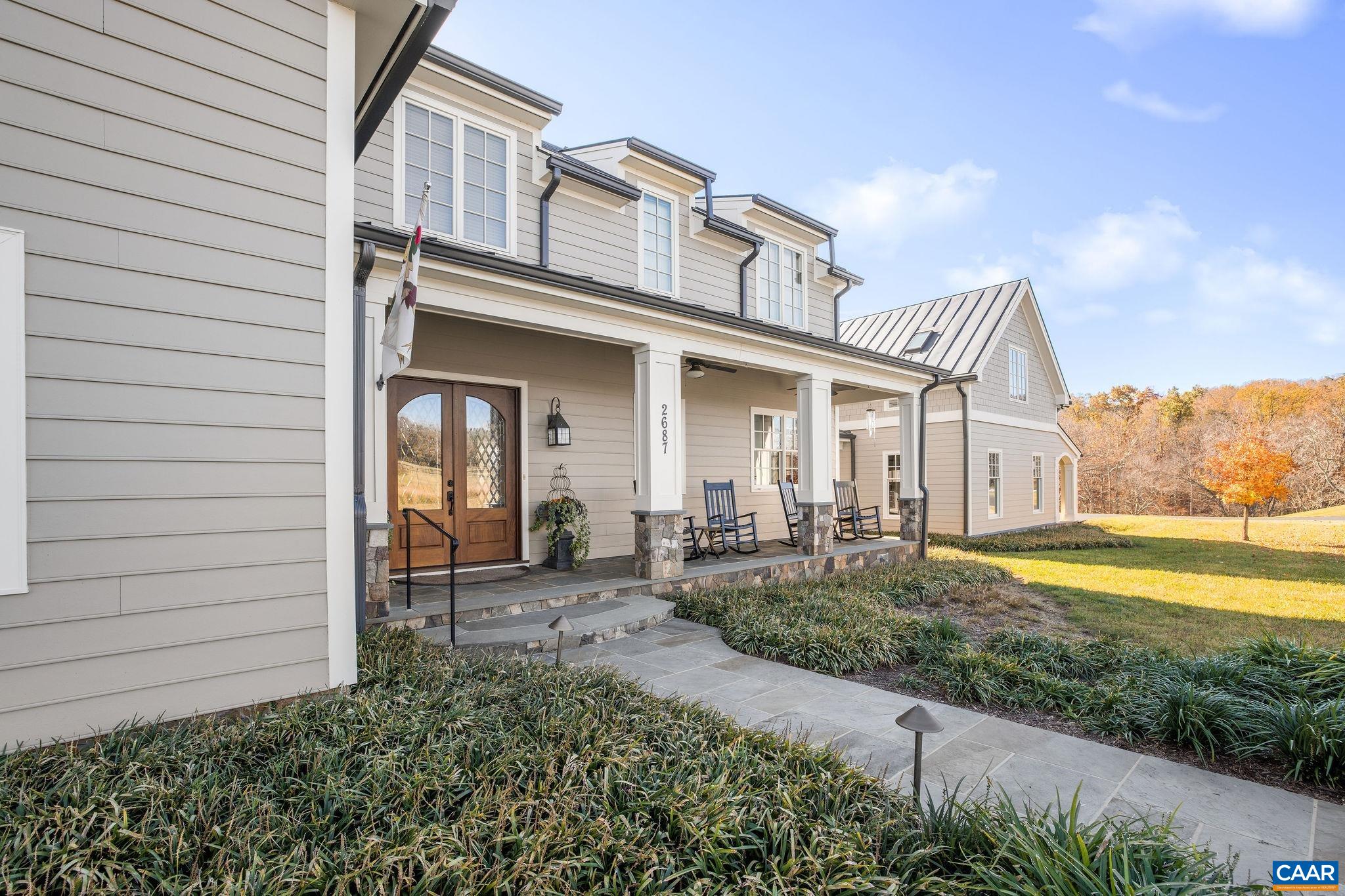 2687 Milton Farm Charlottesville, VA 22902 - Photo 6 of 75 a front view of a house with garden
