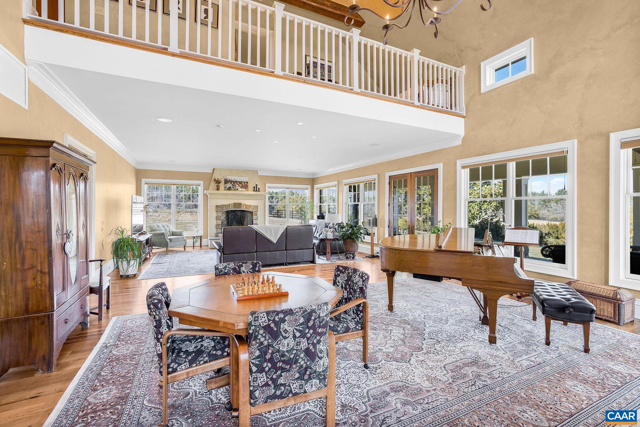2687 Milton Farm Charlottesville, VA 22902 - Photo 62 of 75 a living room with furniture a window and a table