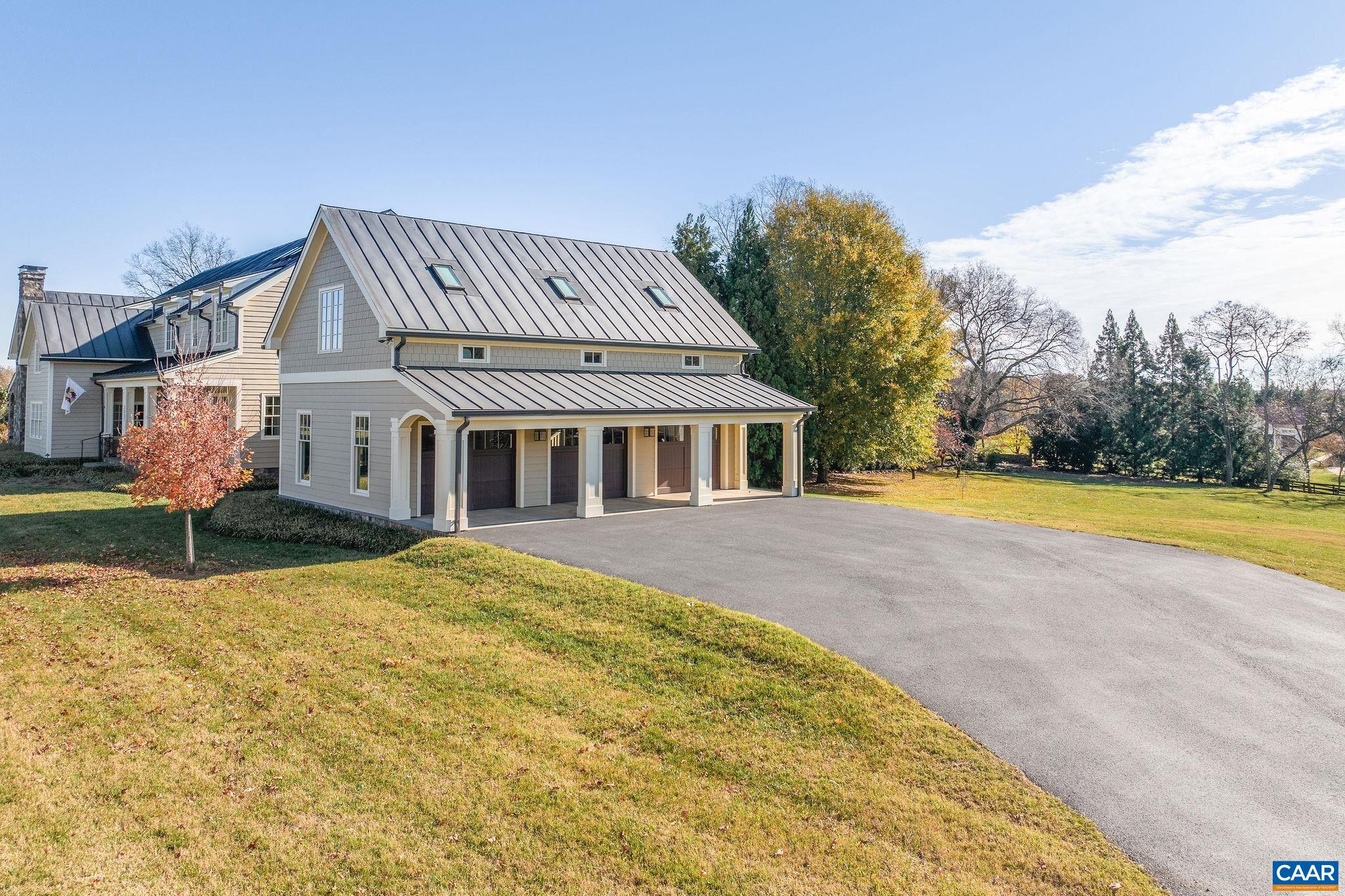 2687 Milton Farm Charlottesville, VA 22902 - Photo 7 of 75 a front view of house with yard and swimming pool
