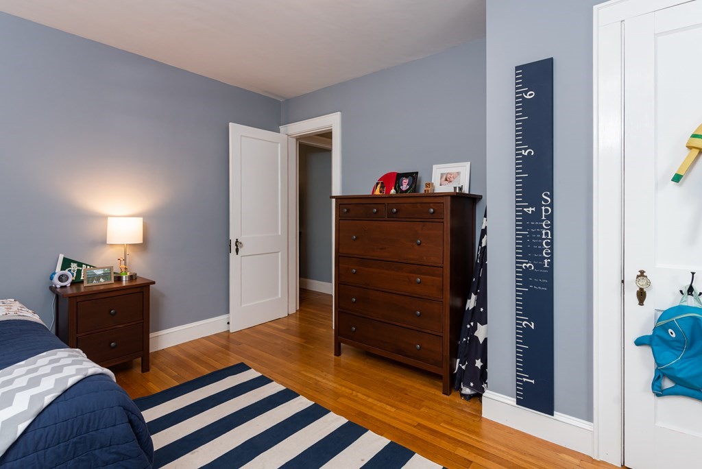 93 Gould Road Andover, MA 01810 - Photo 18 of 39 a bedroom with a bed and furniture