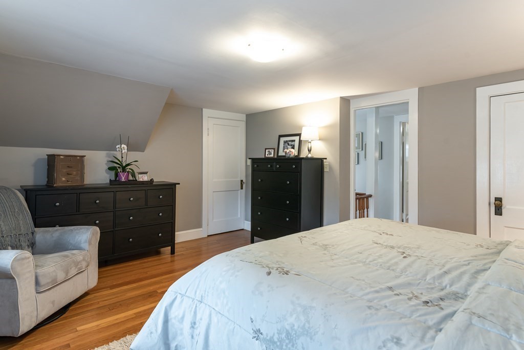 93 Gould Road Andover, MA 01810 - Photo 21 of 39 a bedroom with a bed and a dresser