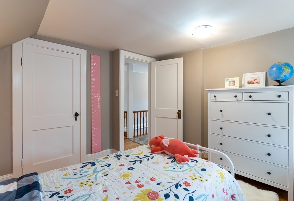 93 Gould Road Andover, MA 01810 - Photo 22 of 39 a bedroom with a bed and a window