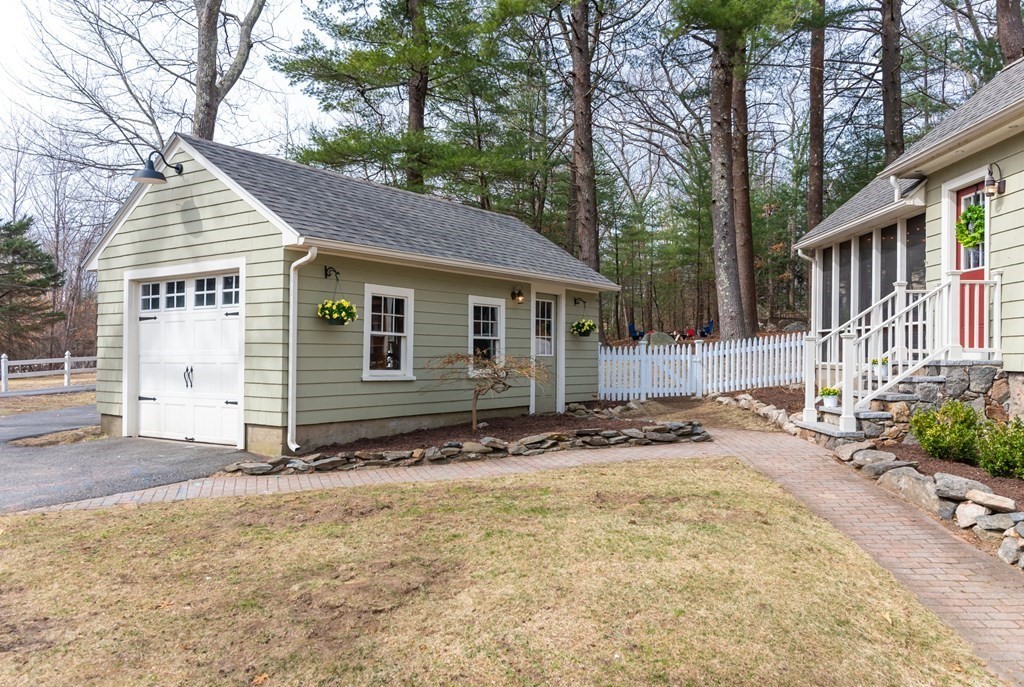 93 Gould Road Andover, MA 01810 - Photo 4 of 39 a view of a house with a yard covered with snow
