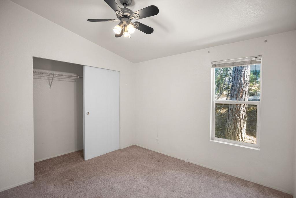 1281 Pleasant Valley Road, Unit 44 Diamond Springs, CA 95619 - Photo 17 of 27 a view of an empty room with a window