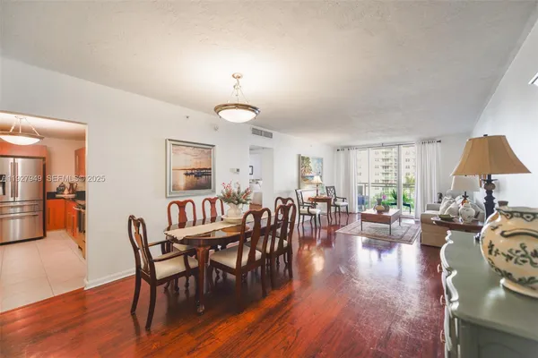 a view of a livingroom with furniture and a table