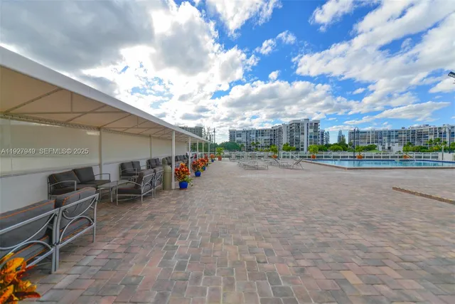 a view of gym equipment and kitchen view