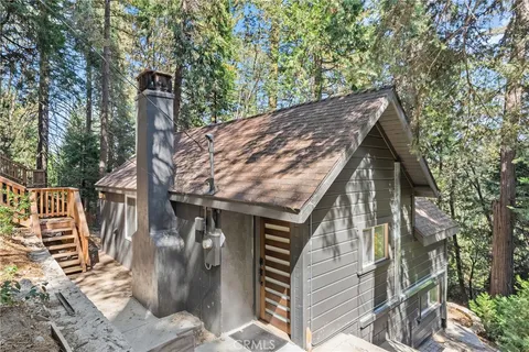 a view of a wooden deck and a trees