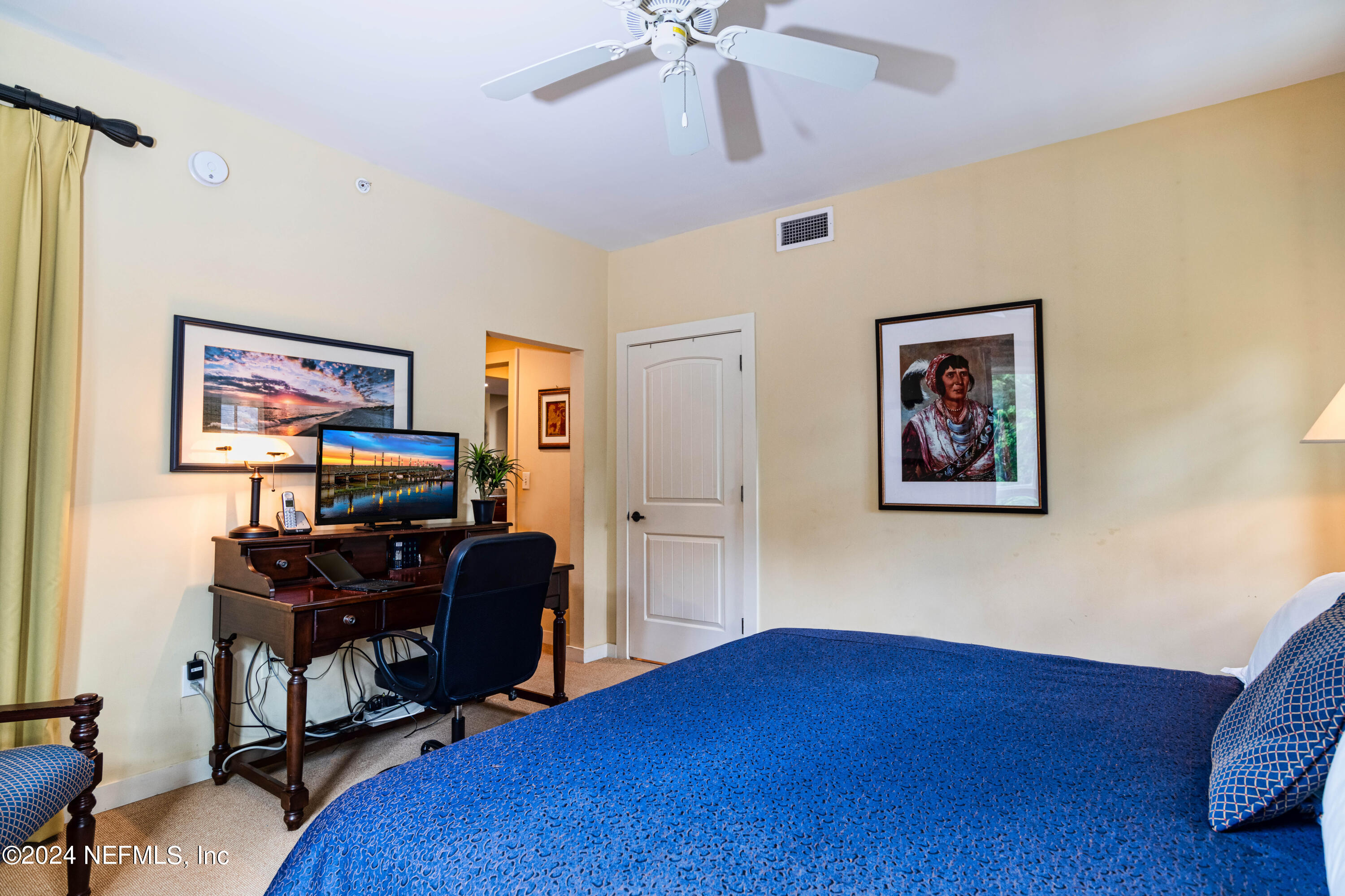 955 Registry Boulevard, Unit 229 St. Augustine, FL 32092 - Photo 25 of 36 a view of a livingroom with workspace and a window