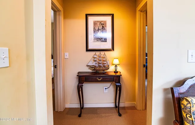 a room with a door and a table