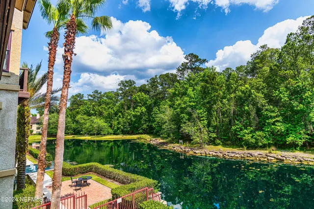 a view of a lake from a balcony