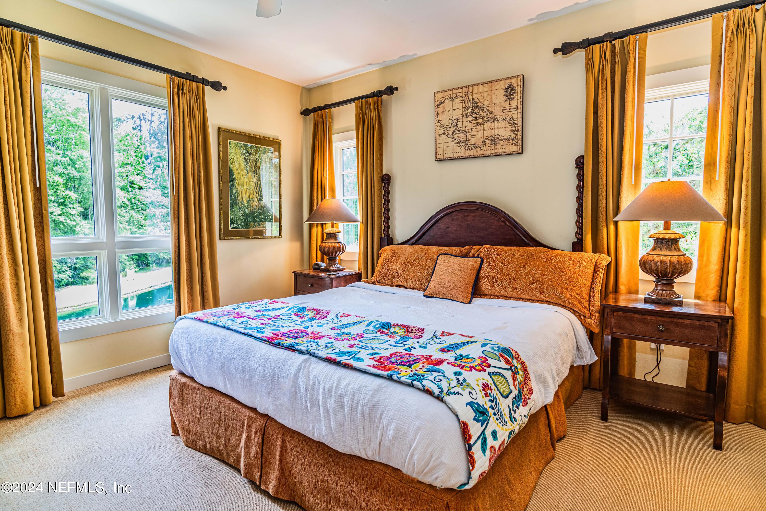 955 Registry Boulevard, Unit 229 St. Augustine, FL 32092 - Photo 7 of 36 a bedroom with a bed and window