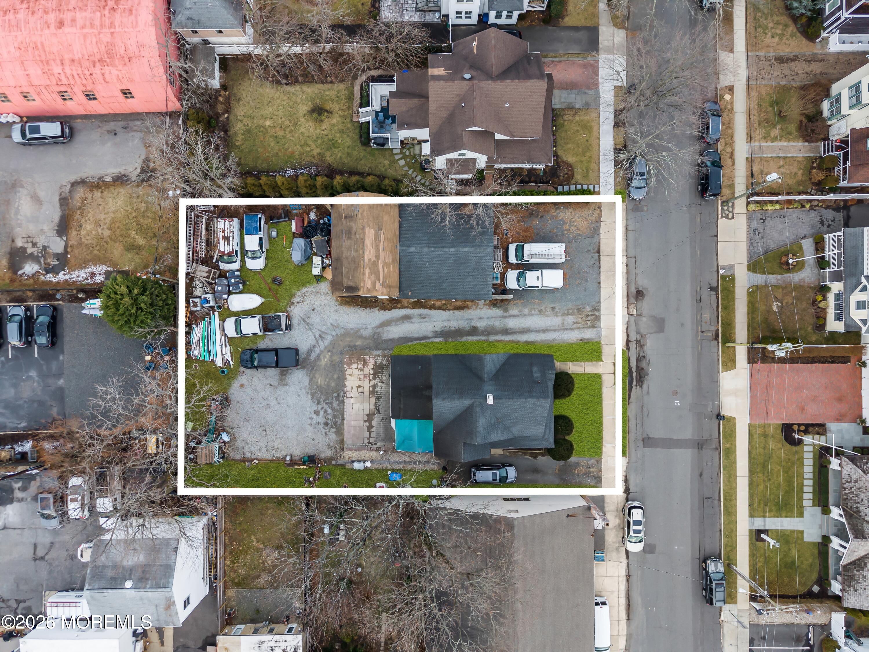 Undisclosed Address Manasquan, NJ 08736 - Photo 52 of 52 an aerial view of a house with a yard and fountain