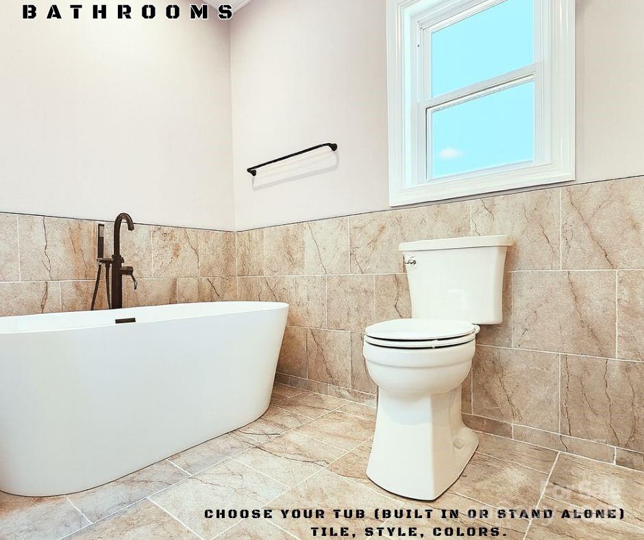 0 George Brown Road, Unit 7 Crouse, NC 28033 - Photo 8 of 22 a white toilet sitting next to a white tub