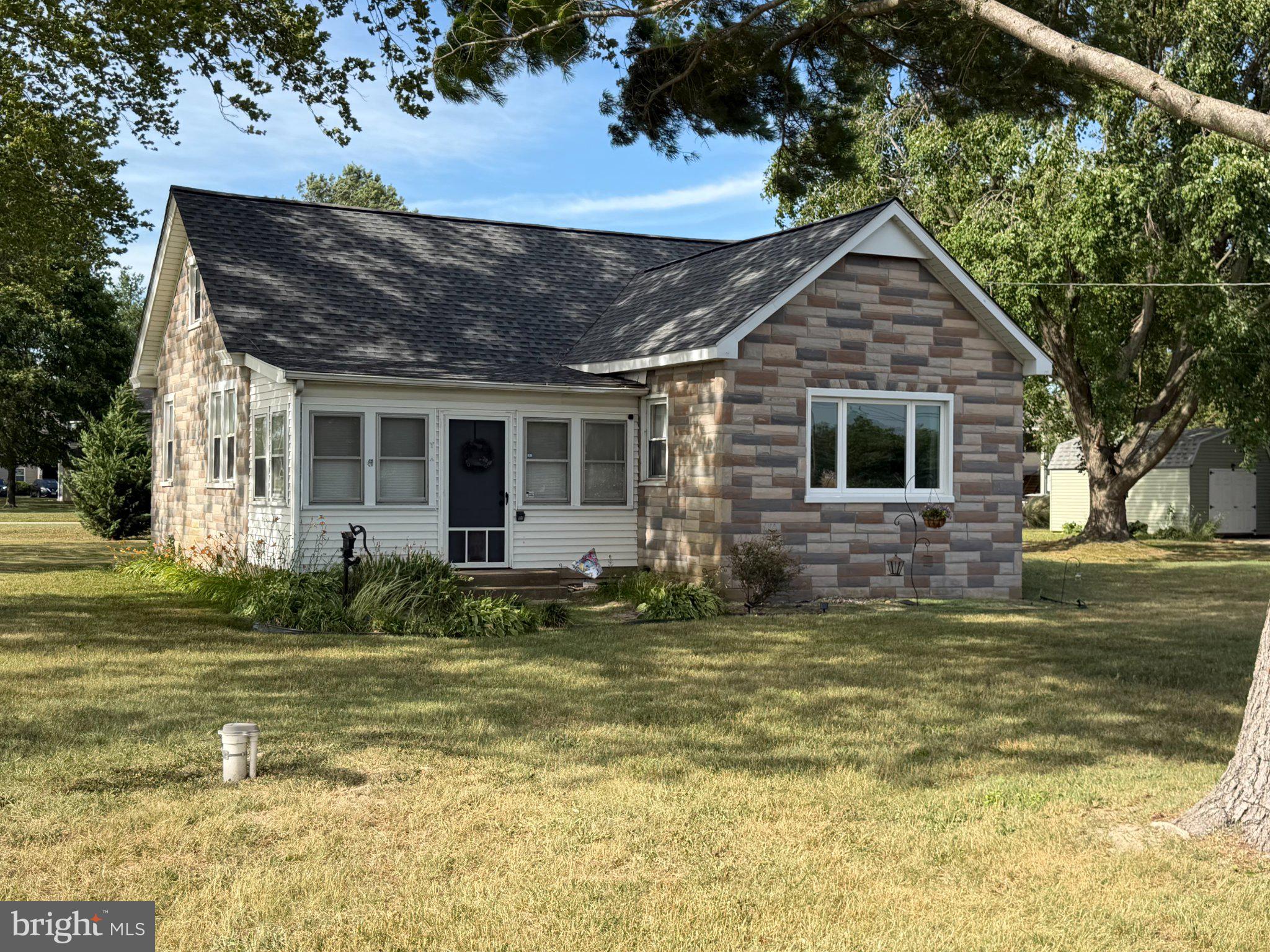 504 Sunset Boulevard Ridgely, MD 21660 - Photo 4 of 5 Charming stone-fronted cottage retreat.