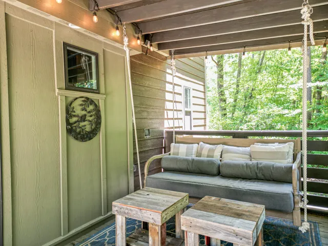 a kitchen with stainless steel appliances granite countertop a refrigerator sink and stove