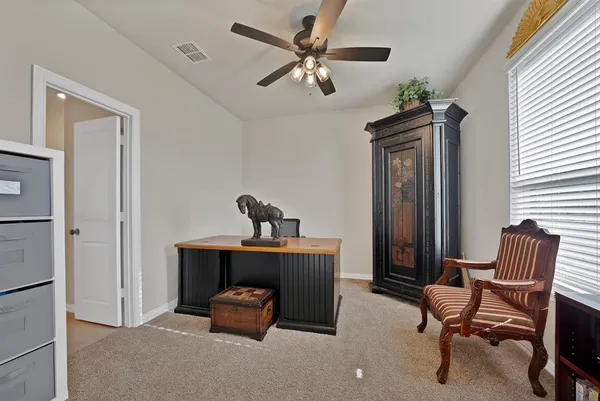 a room with furniture and a window