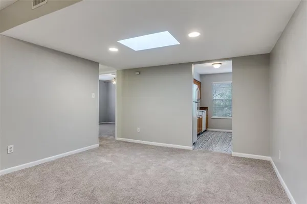 a kitchen that has a stove and a microwave