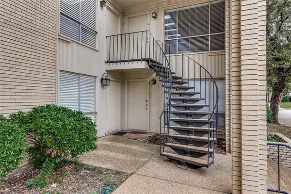 a view of entryway with stairs