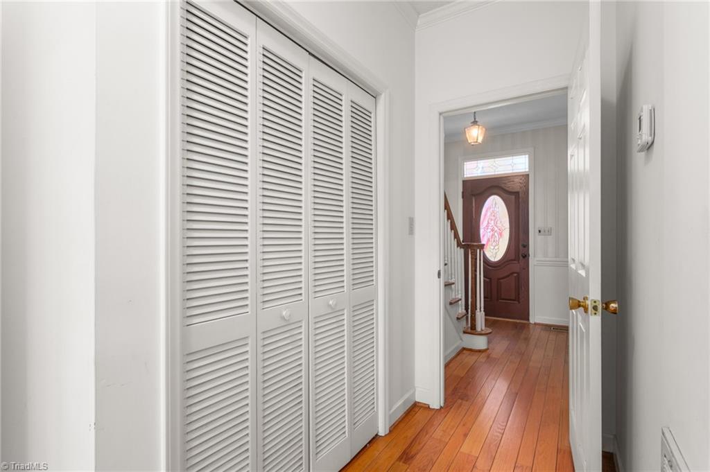 4813 Carlson Valley Road Summerfield, NC 27358 - Photo 21 of 46 Hallway with Main Level Laundry Closet