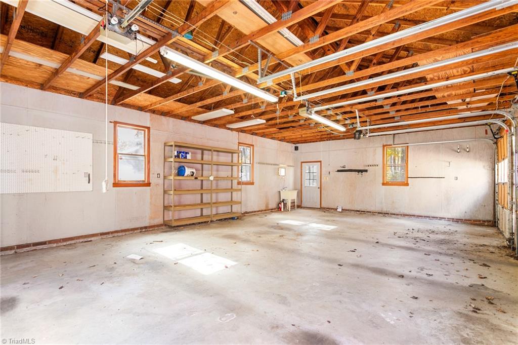 4813 Carlson Valley Road Summerfield, NC 27358 - Photo 41 of 46 3-Car Garage Interior