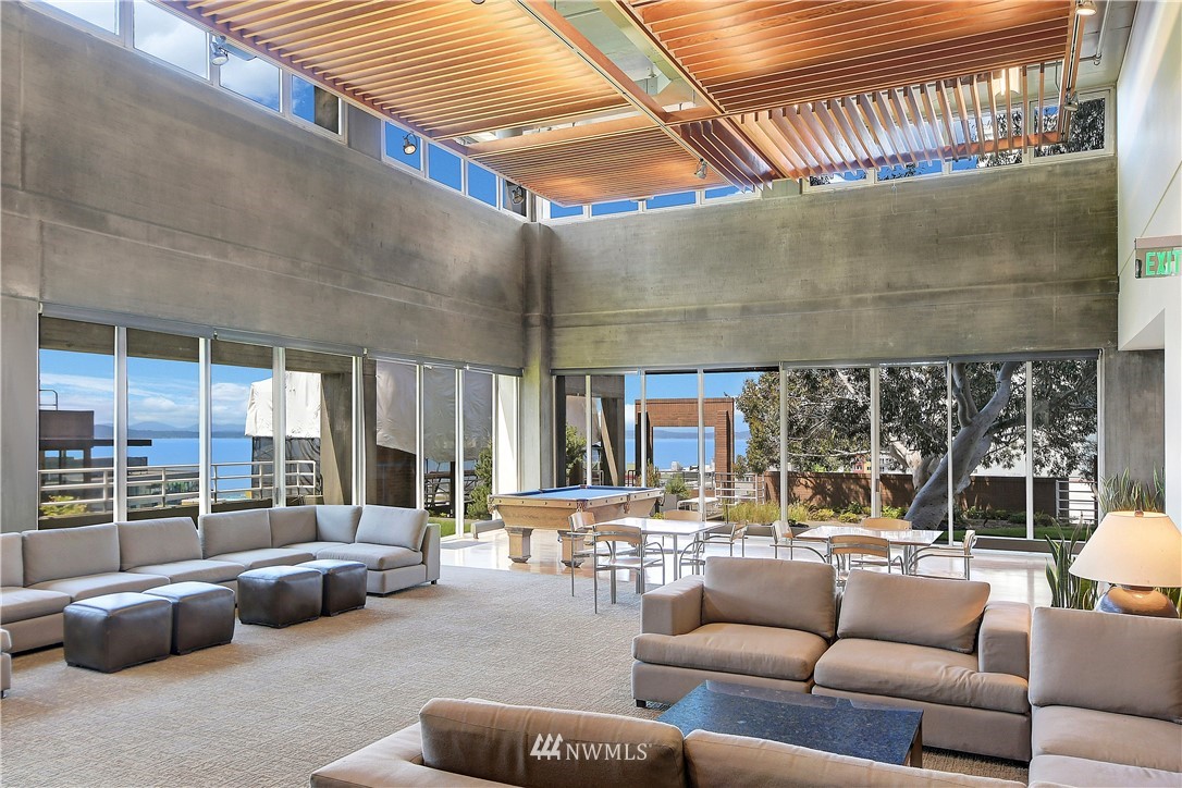 2125 1st Avenue, Unit 1702 Seattle, WA 98121 - Photo 21 of 31 a living room with furniture and a large window