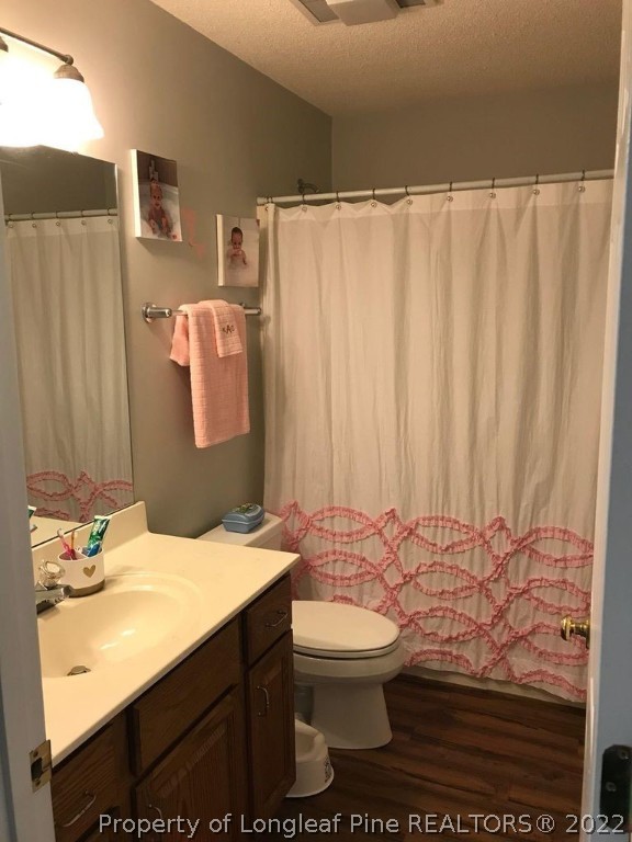 21 Princess Gate Whispering Pines, NC 28327 - Photo 31 of 33 a bathroom with a sink and a mirror