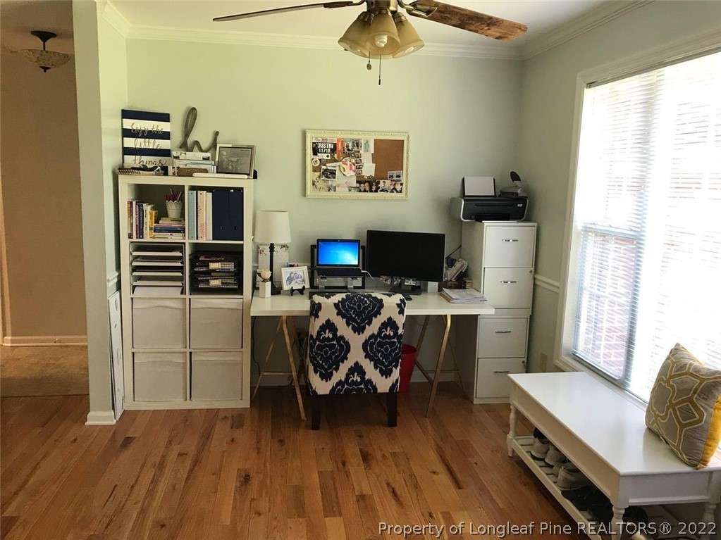21 Princess Gate Whispering Pines, NC 28327 - Photo 4 of 33 a view of a workspace with furniture and a window