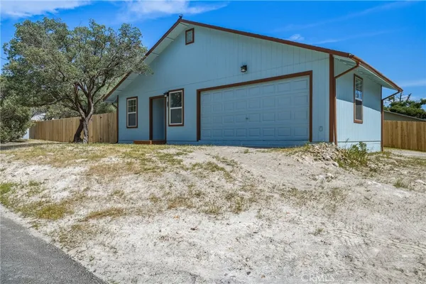 a kitchen with a stove and a microwave