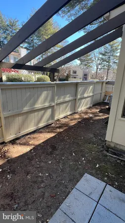 a view of a balcony with two chairs