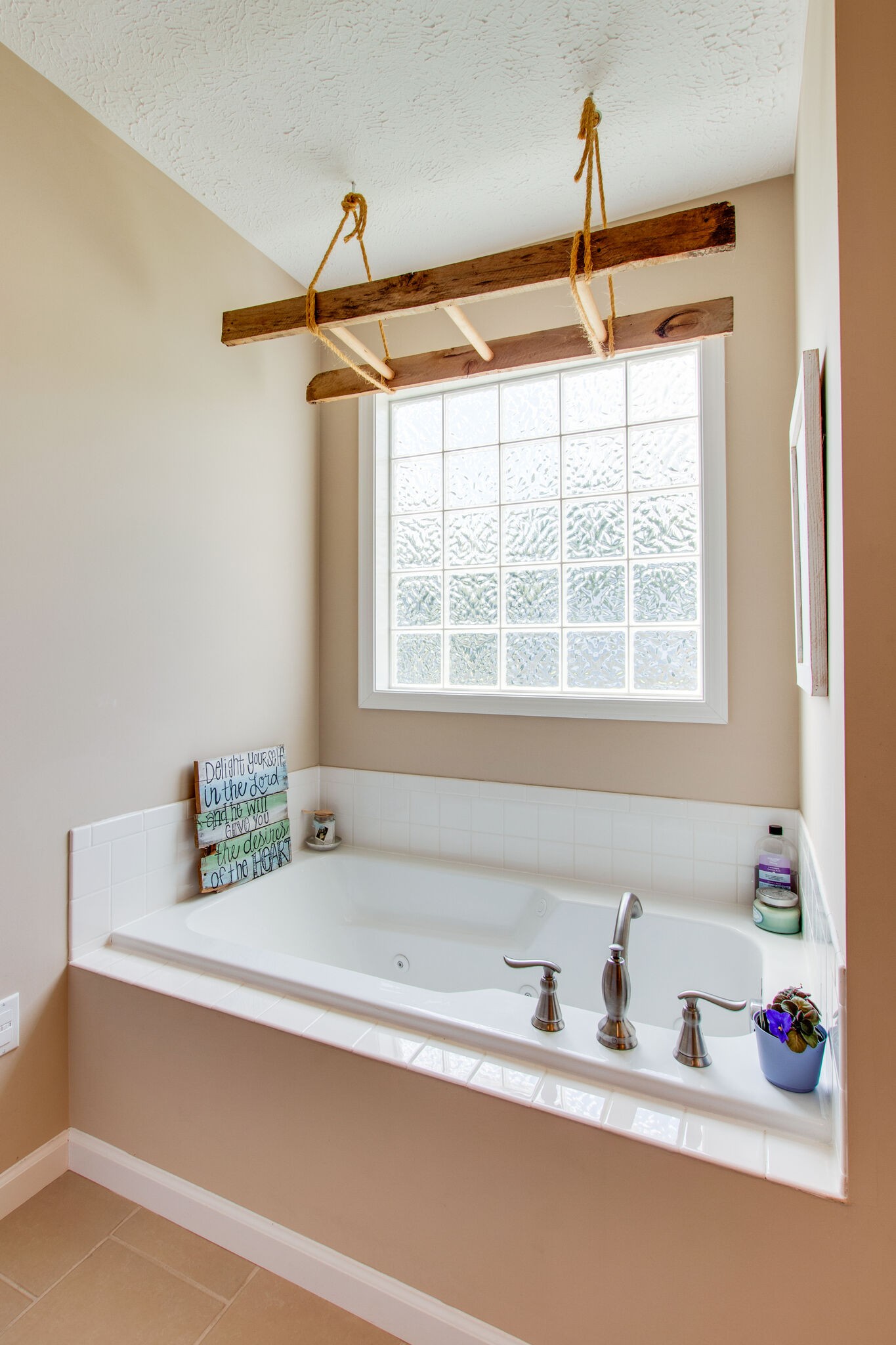 84 Houston Bell Road Manchester, TN 37355 - Photo 17 of 36 a bathroom with a window sink and bathtub