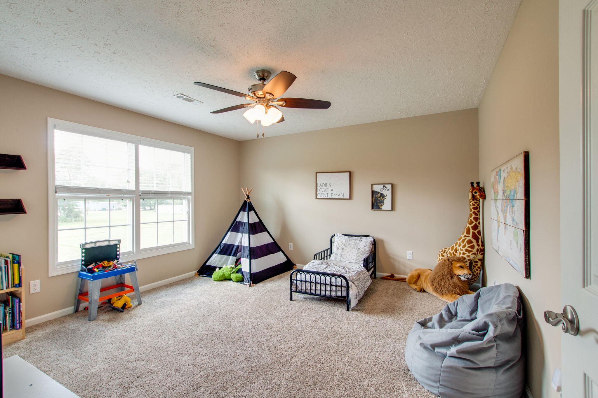 84 Houston Bell Road Manchester, TN 37355 - Photo 20 of 36 a living room with furniture and a flat screen tv