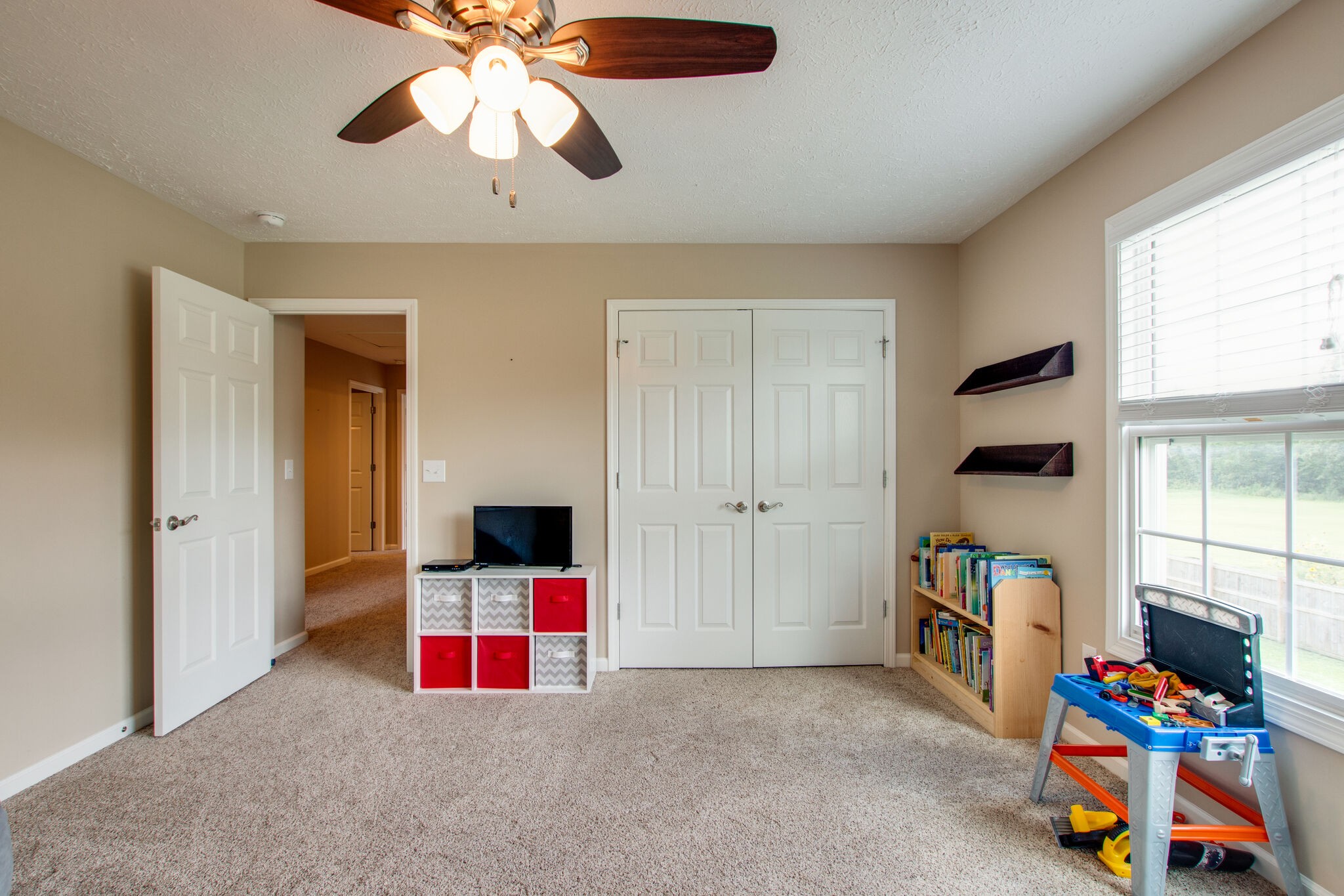 84 Houston Bell Road Manchester, TN 37355 - Photo 21 of 36 a bedroom with furniture and a window