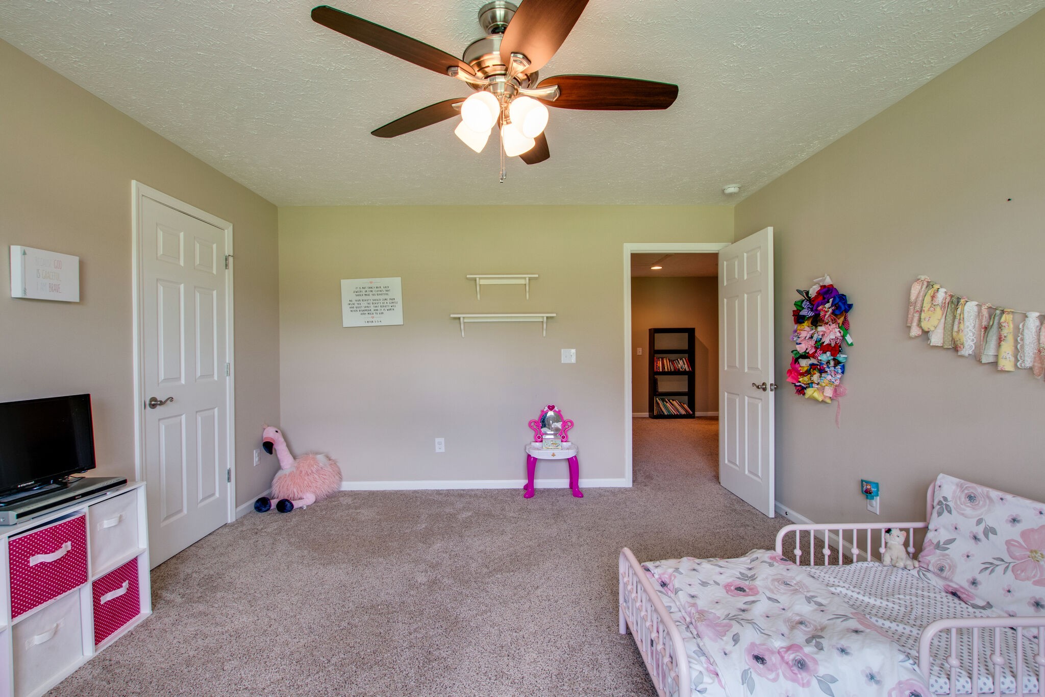 84 Houston Bell Road Manchester, TN 37355 - Photo 23 of 36 a bedroom with a bed and a flat screen tv