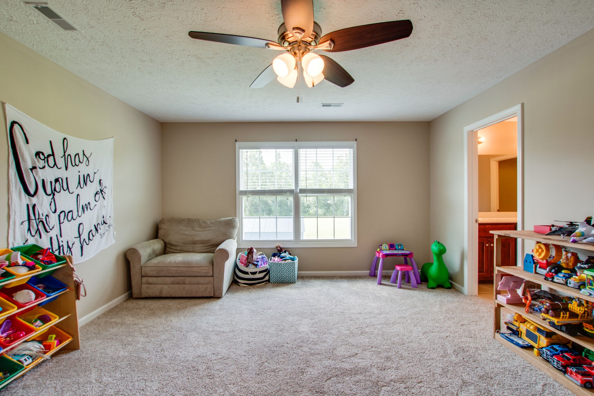 84 Houston Bell Road Manchester, TN 37355 - Photo 26 of 36 a bed room with furniture and a window