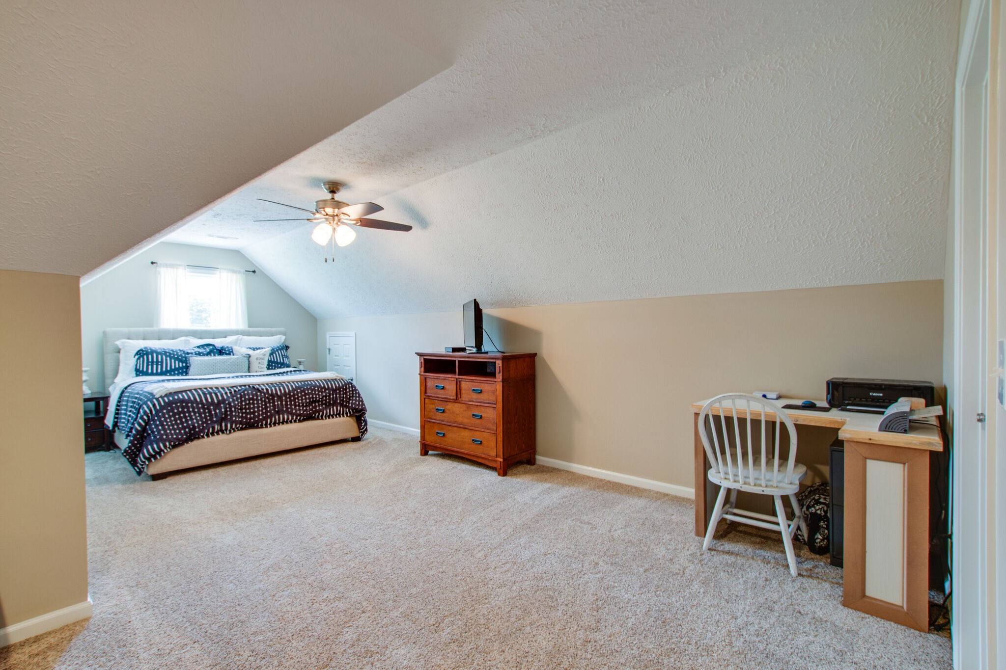 84 Houston Bell Road Manchester, TN 37355 - Photo 27 of 36 a bedroom with a bed and a chair