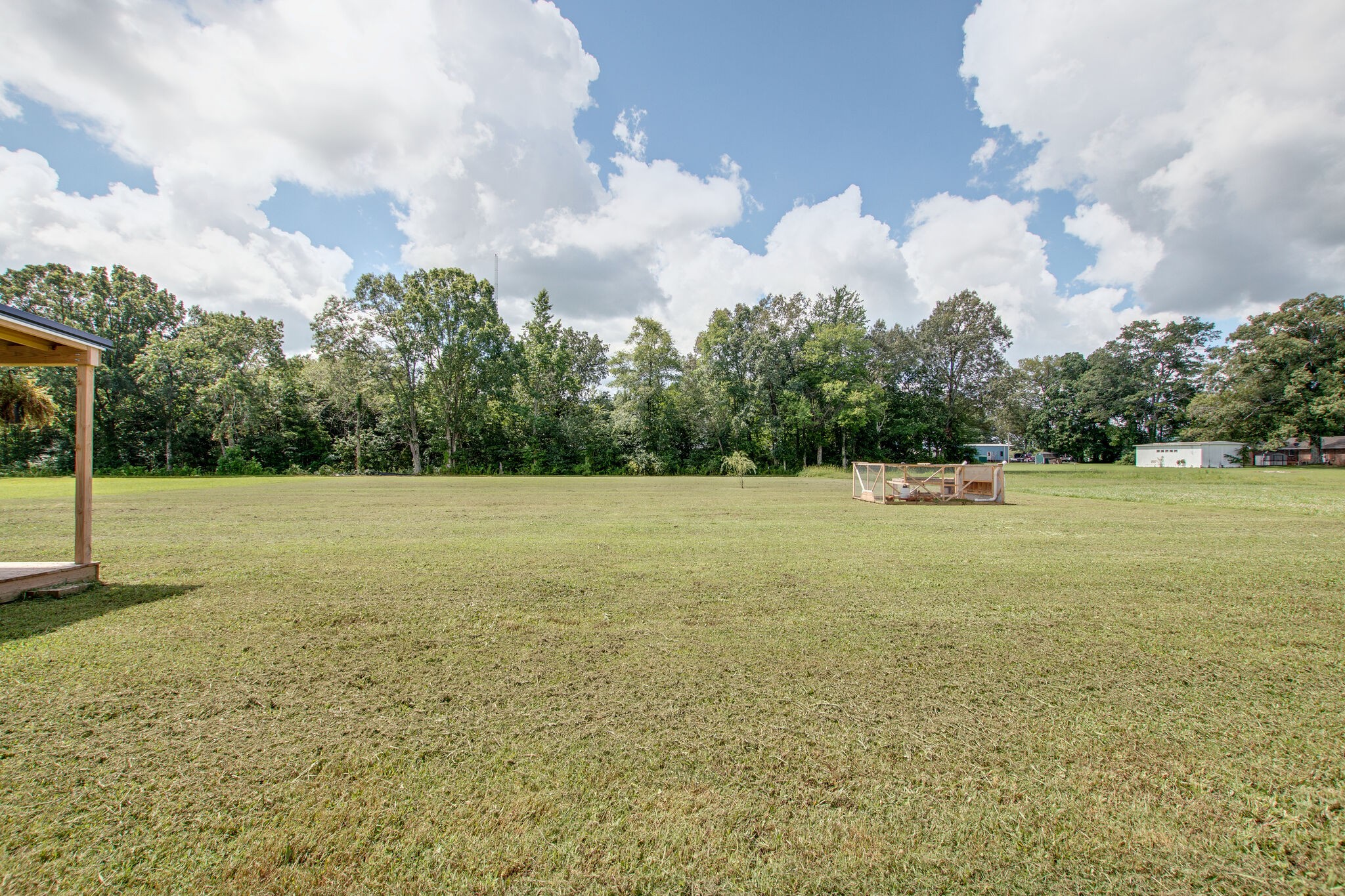 84 Houston Bell Road Manchester, TN 37355 - Photo 32 of 36 a view of a field with trees in the background