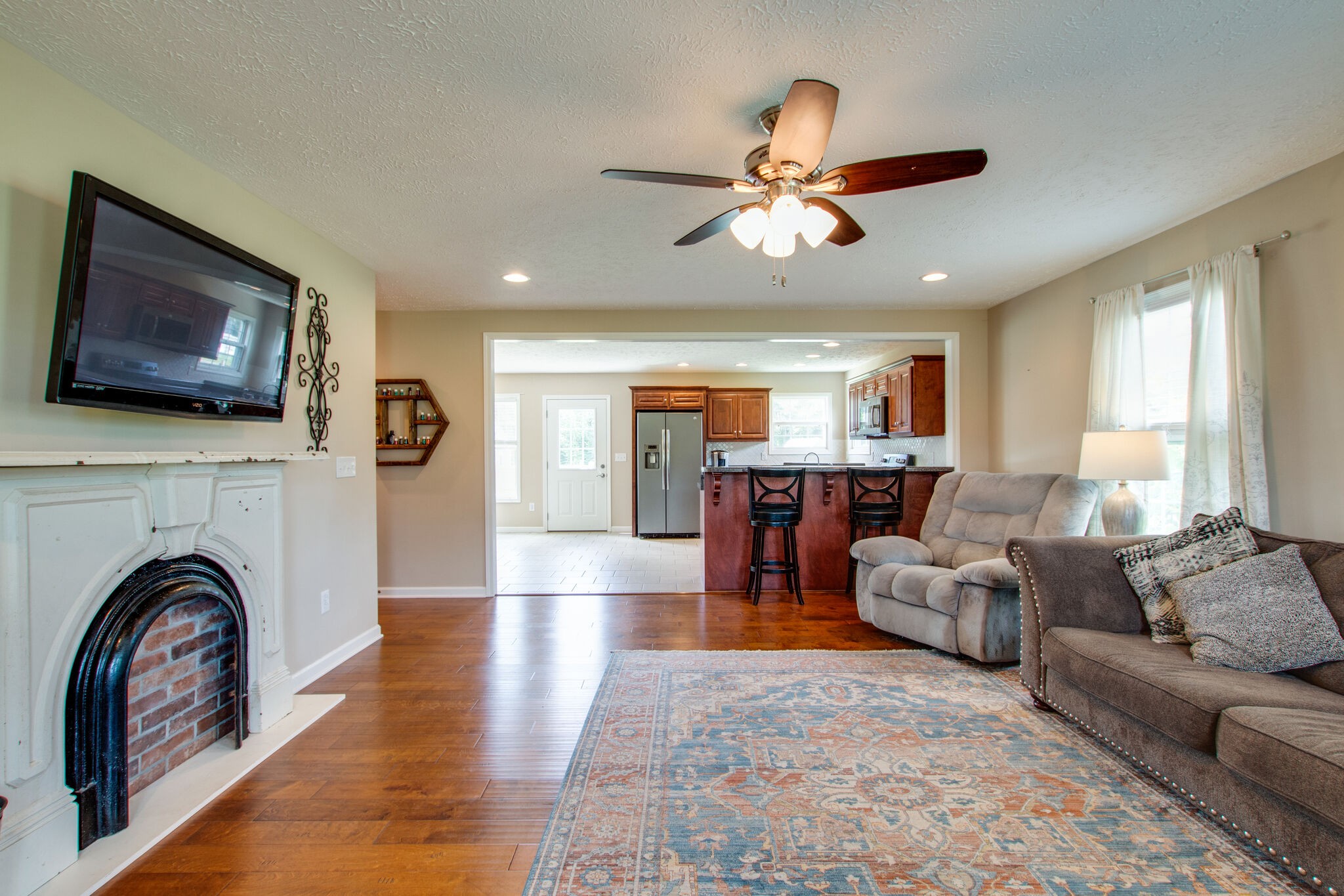 84 Houston Bell Road Manchester, TN 37355 - Photo 8 of 36 a living room with furniture and a fireplace