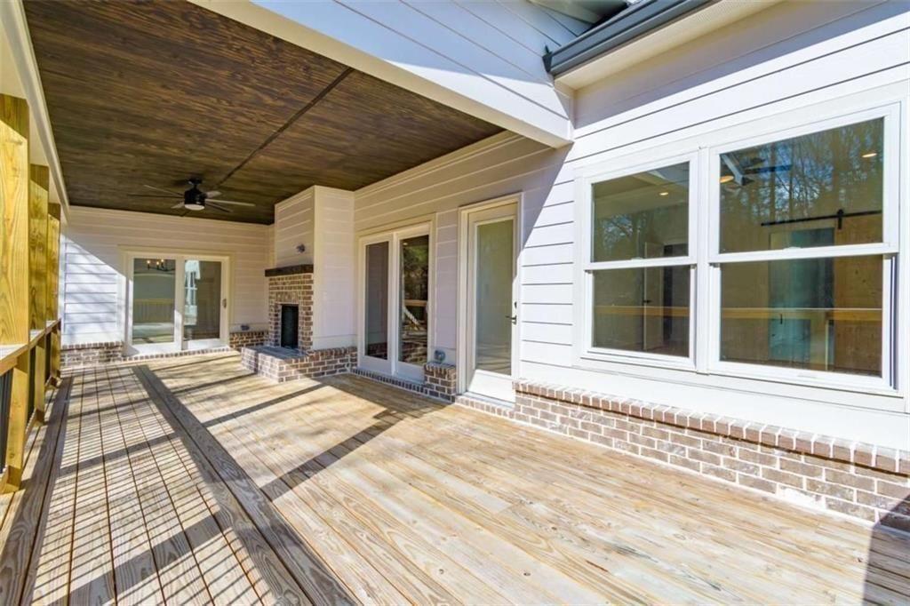 5808 Swinging Gate Road Gainesville, GA 30506 - Photo 29 of 59 a view of a lounge chair on the house