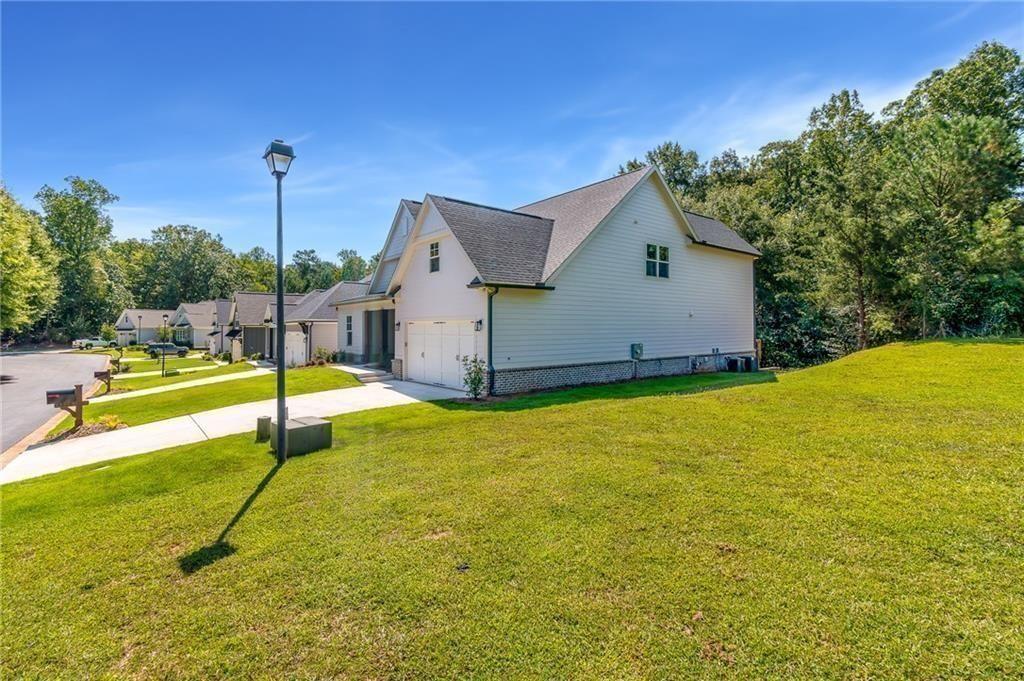 5808 Swinging Gate Road Gainesville, GA 30506 - Photo 45 of 59 a house view with a swimming pool