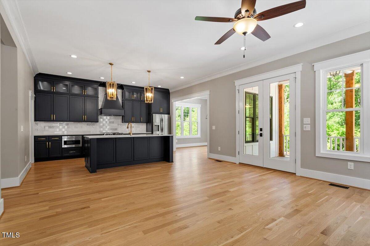 3934 Old Chapel Hill Road Durham, NC 27707 - Photo 24 of 47 a view of kitchen with cabinets and flat screen tv